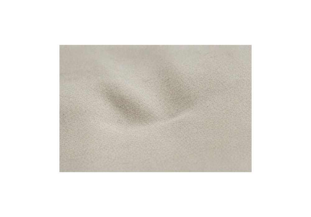 Soft folded fabric representing heaviness and physical weight of grief in the body (Victoria BC grief counselling)