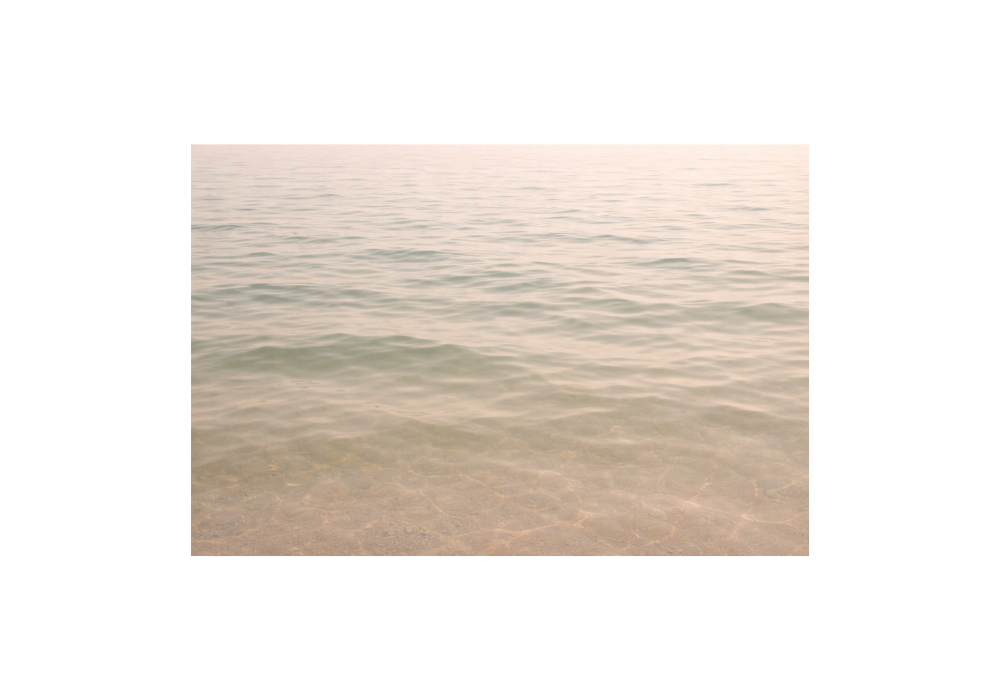 Gentle water ripples in soft natural light symbolizing waves of grief (grief counselling blog image Victoria BC)