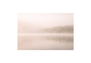 Misty lake with low visibility representing unclear and unseen grief (grief counselling blog Victoria BC)