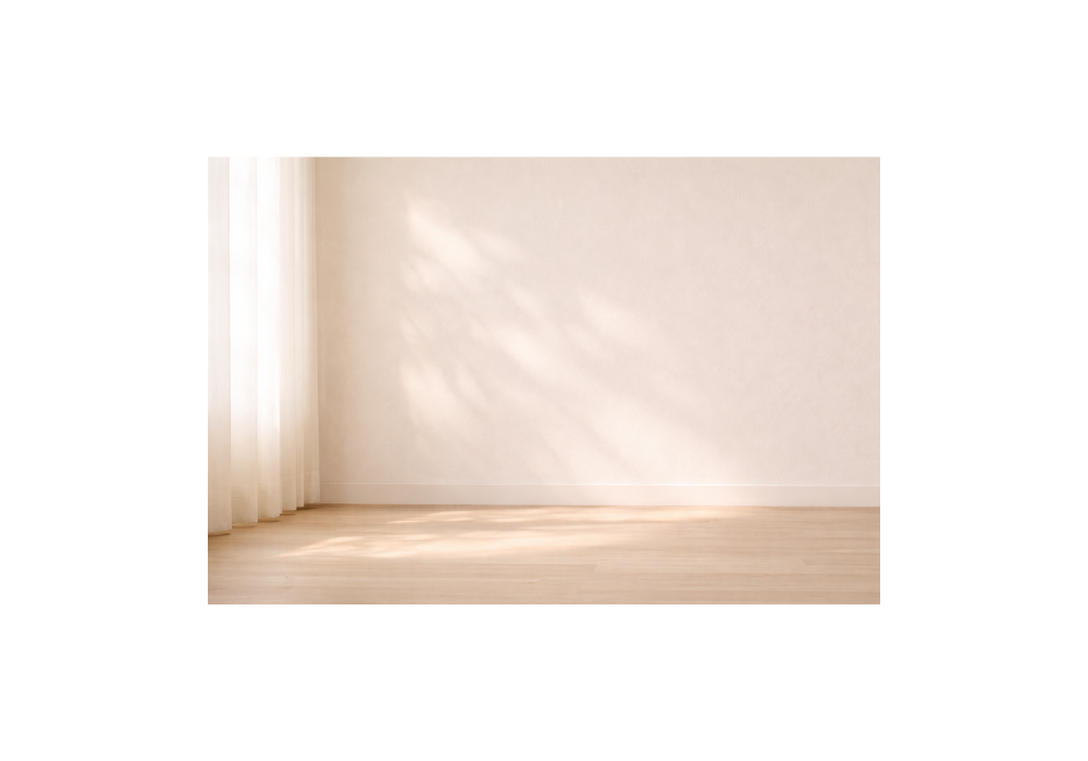 Soft morning light through sheer curtain onto wooden floor symbolizing unseen grief (grief counselling Victoria BC)