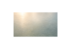 A soft, minimalist image of still shallow water with gentle light reflections and quiet neutral tones creating a calm and spacious feeling (grief counselling Victoria BC)